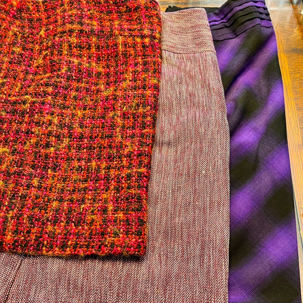 Lot of The Limited purple and red skirts